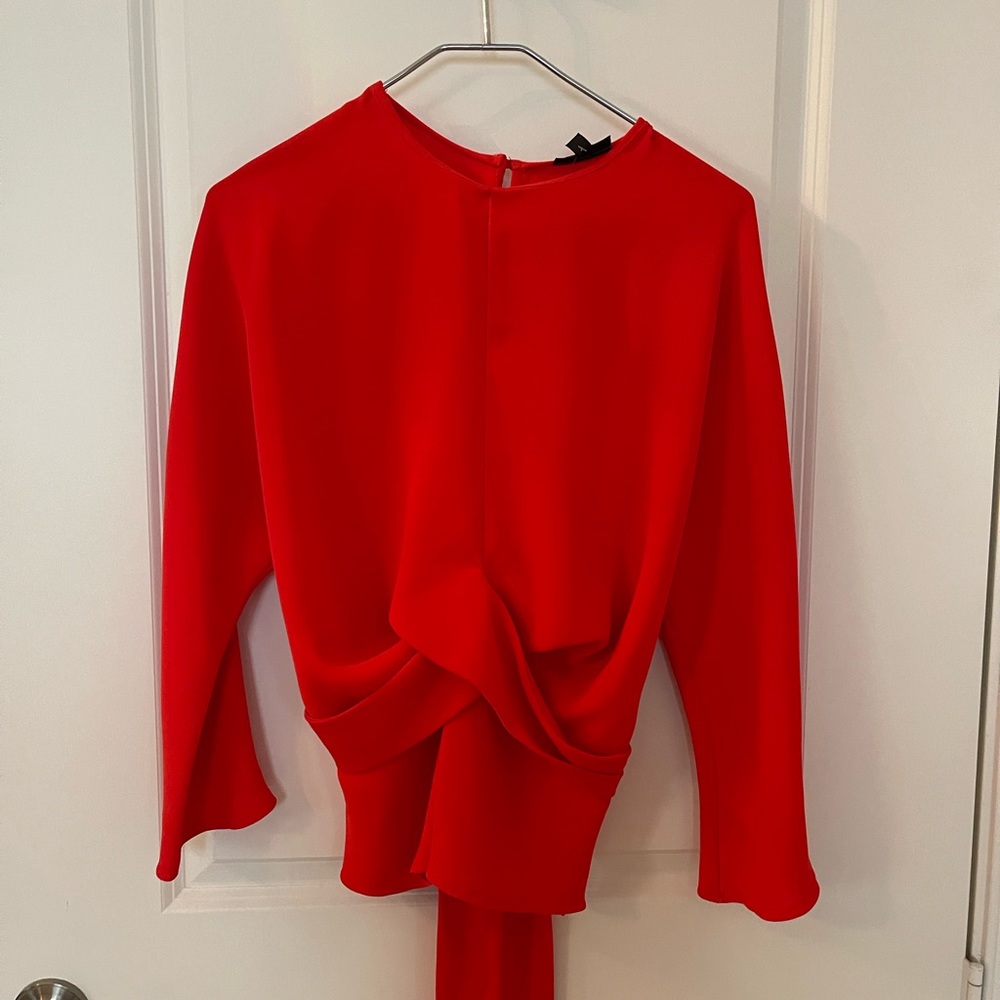 TopShop red women’s shirt.
